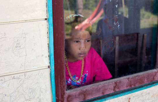 Mentawai girl trapped in a school classroom