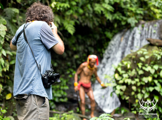 Fairfax photojournalist, Chris Hopkins, photographing Indigenous Mentawai, Siberut Island